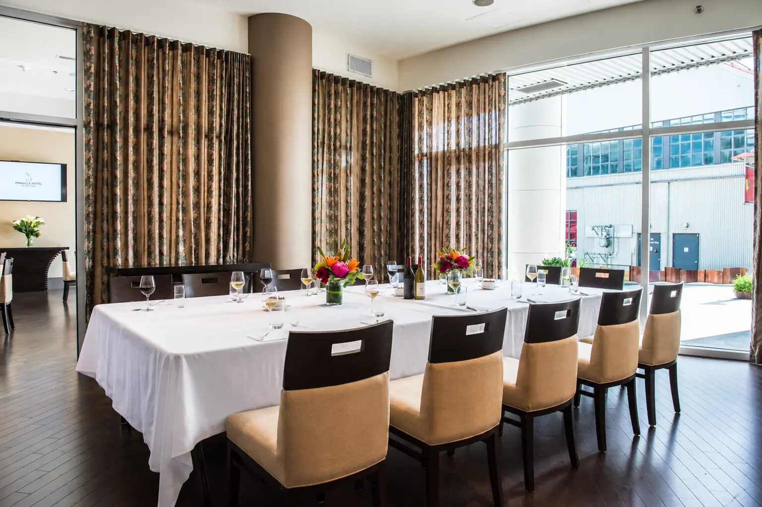Private Dining Room set for a banquet with floral centrepieces at The Lobby Restaurant